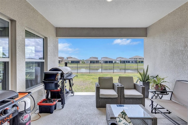 12710 Hysmith Loop, Parrish, FL 34219 - balcony featuring a water view, a residential view, a patio area, a grill, and an outdoor living space