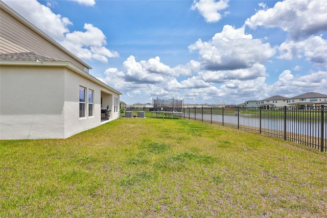 12710 Hysmith Loop, Parrish, FL 34219 - view of yard with a trampoline and a water view