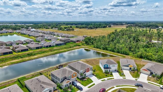 12710 Hysmith Loop, Parrish, FL 34219 - aerial perspective of suburban area featuring a large body of water