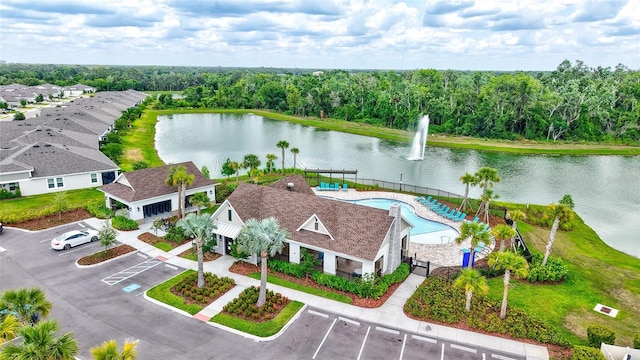 12710 Hysmith Loop, Parrish, FL 34219 - bird's eye view of a nearby body of water, a pool area, and a heavily wooded area