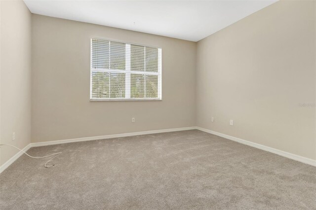1330 Mariposa Cir Unit 104, Naples, FL 34105 - unfurnished room with carpet floors and baseboards