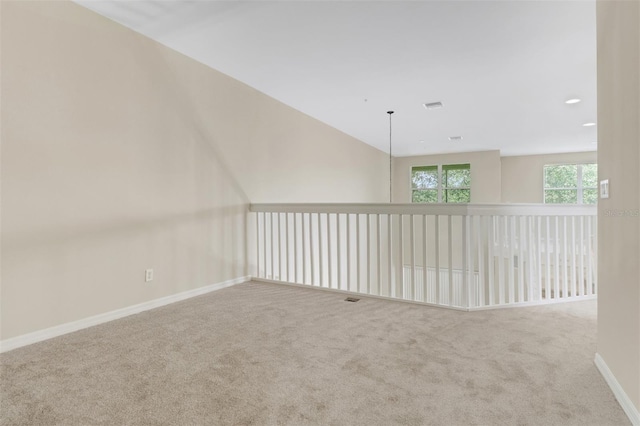 1330 Mariposa Cir Unit 104, Naples, FL 34105 - spare room featuring carpet floors and baseboards