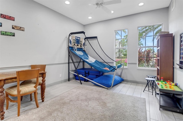 1330 Mariposa Cir Unit 104, Naples, FL 34105 - playroom with a ceiling fan and recessed lighting