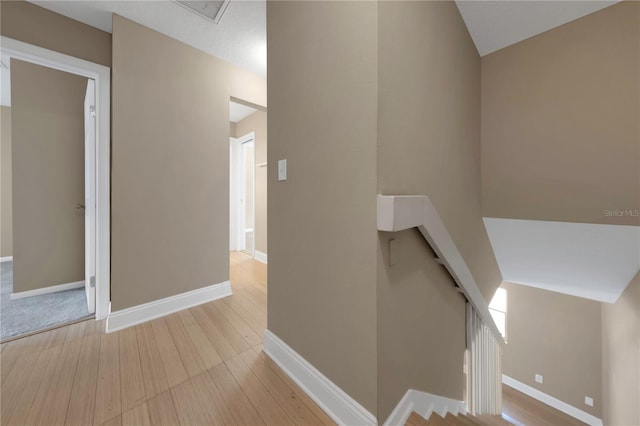 2048 Los Lomas Dr, Clearwater, FL 33763 - stairway with wood finished floors and baseboards