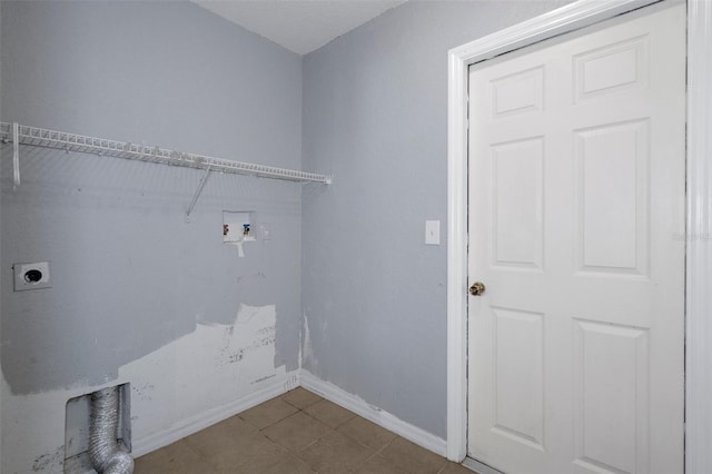 laundry room featuring hookup for an electric dryer, baseboards, washer hookup, and tile patterned floors