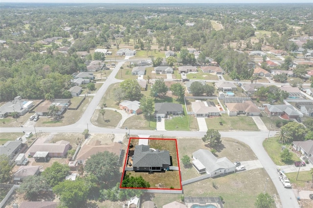 aerial perspective of suburban area with property parcel outlined