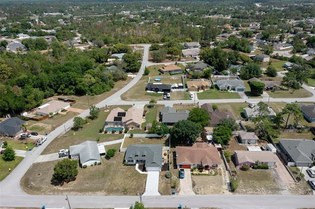 aerial overview of property's location with nearby suburban area
