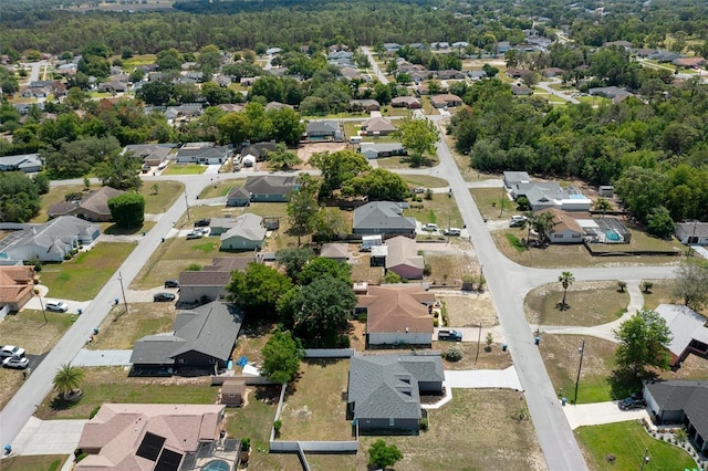aerial overview of property's location featuring nearby suburban area