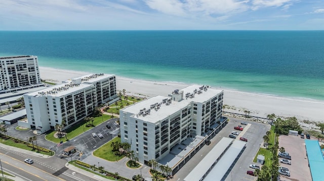 aerial view of extended coastline and apartment complex