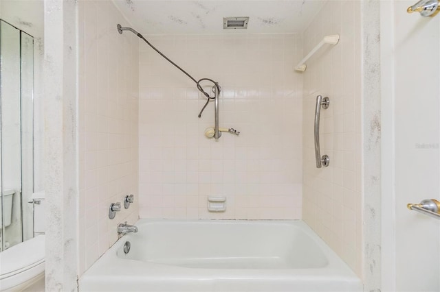 full bath featuring toilet and washtub / shower combination