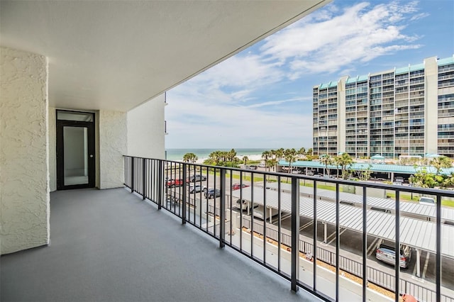 balcony featuring a water view