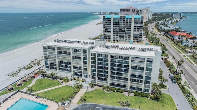 aerial view of apartment complex / building and extended coastline