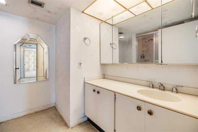 1400 Gulf Blvd Unit 306, Clearwater Beach, FL 33767 - bathroom with vanity and a shower