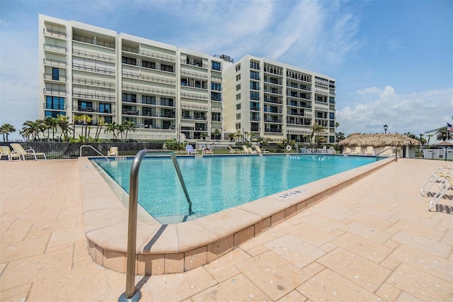 1400 Gulf Blvd Unit 306, Clearwater Beach, FL 33767 - community pool featuring a patio