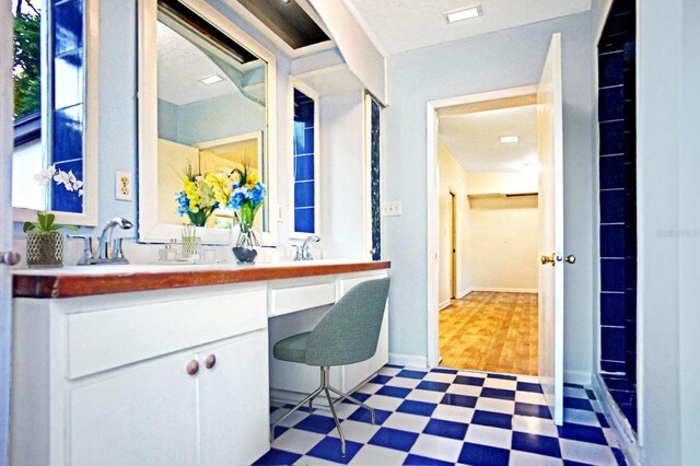 1111 Briarwood Rd, Brandon, FL 33511 - full bathroom with tile patterned floors and double vanity