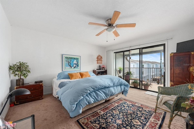 745 Pinellas Bayway S Unit 206, Saint Petersburg, FL 33715 - carpeted bedroom featuring access to exterior and a ceiling fan