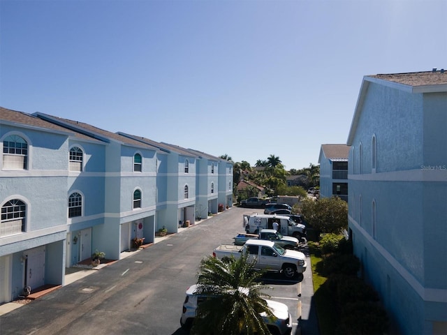 745 Pinellas Bayway S Unit 206, Saint Petersburg, FL 33715 - view of asphalt road with a residential view
