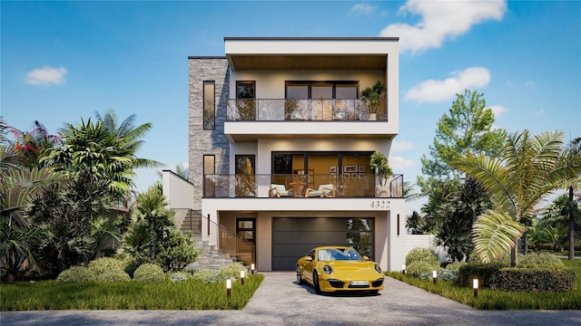 4322 26th Ave S, Gulfport, FL 33711 - contemporary home featuring stucco siding, asphalt driveway, a balcony, a garage, and stairs
