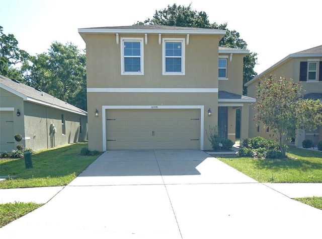 10928 Carlton Fields Dr, Riverview, FL 33579 - traditional-style house with concrete driveway, stucco siding, and a garage