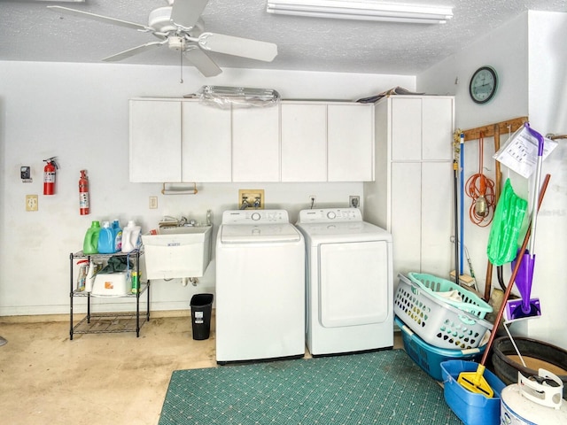 washroom with separate washer and dryer, ceiling fan, a textured ceiling, and cabinet space