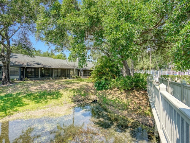 view of yard featuring fence