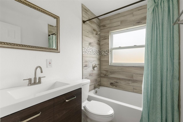 bathroom with toilet, shower / bath combo with shower curtain, and vanity