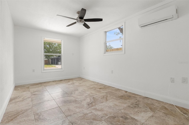 unfurnished room with a wall mounted air conditioner, ceiling fan, and baseboards