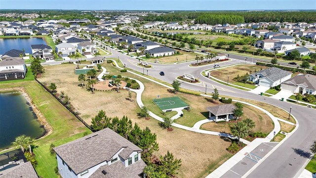 view of property location with nearby suburban area and a nearby body of water