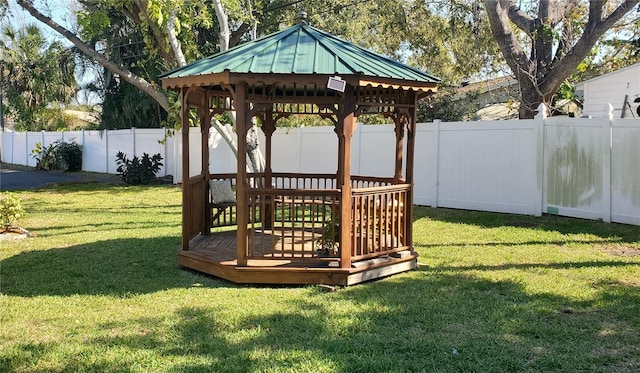 view of yard featuring a gazebo and a wooden deck