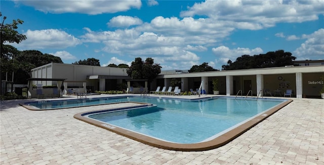community pool with a patio