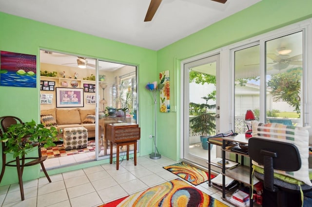 9018 39th Ln N Unit 5, Pinellas Park, FL 33782 - sitting room featuring a ceiling fan and light tile patterned flooring