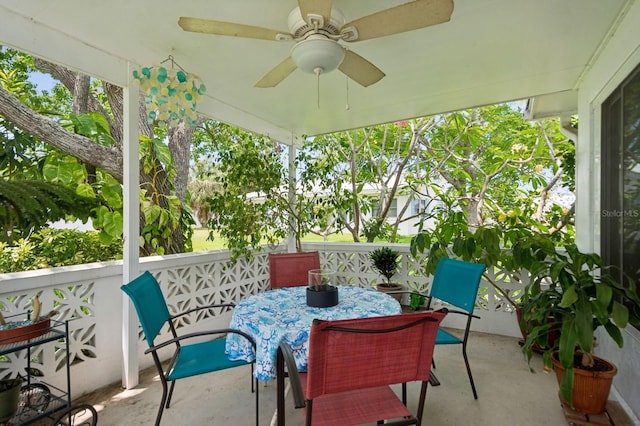 9018 39th Ln N Unit 5, Pinellas Park, FL 33782 - view of patio / terrace featuring ceiling fan and outdoor dining area