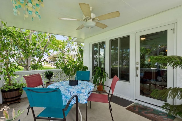 9018 39th Ln N Unit 5, Pinellas Park, FL 33782 - sunroom / solarium with a ceiling fan and outdoor dining space