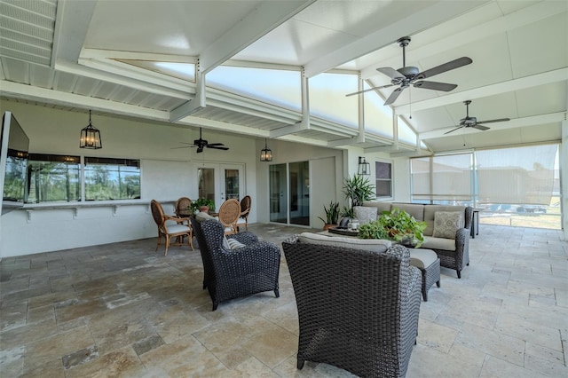 view of patio / terrace with french doors, a ceiling fan, and outdoor lounge area