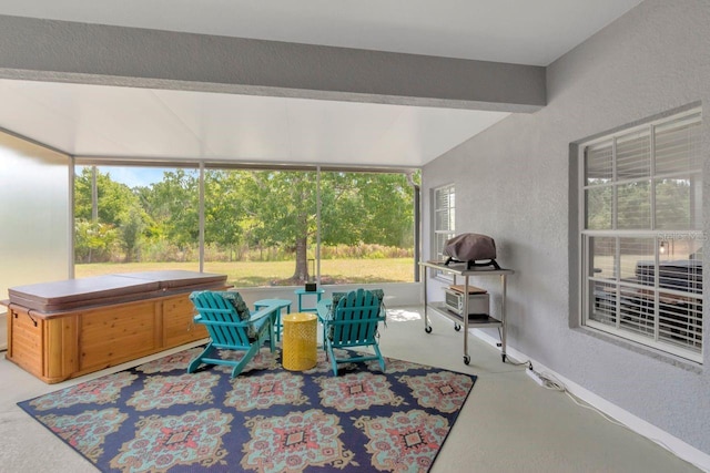 2823 Banyan Hill Ln, Land O Lakes, FL 34639 - sunroom with a hot tub, plenty of natural light, and beamed ceiling