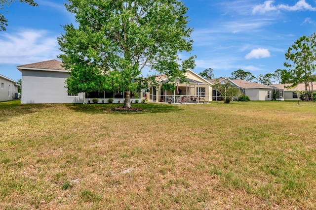 2823 Banyan Hill Ln, Land O Lakes, FL 34639 - view of grassy yard featuring glass enclosure