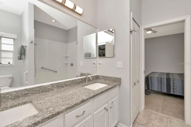2823 Banyan Hill Ln, Land O Lakes, FL 34639 - ensuite bathroom with double vanity, toilet, a shower, and tile patterned floors