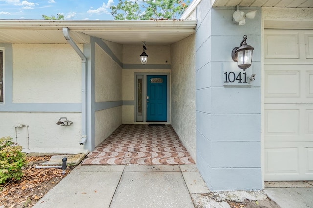 1041 Forest Grove Blvd, Palm Harbor, FL 34683 - doorway to property featuring stucco siding
