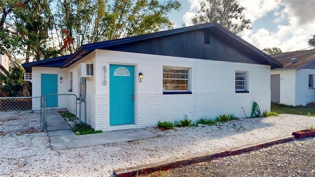 6710 S Juanita St, Tampa, FL 33616 - view of front of property with brick siding, a gate, and fence