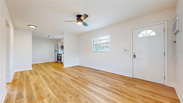 6710 S Juanita St, Tampa, FL 33616 - entryway featuring light wood-type flooring, baseboards, and ceiling fan