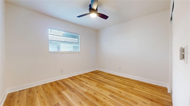 6710 S Juanita St, Tampa, FL 33616 - unfurnished room with light wood-style floors, baseboards, and a ceiling fan