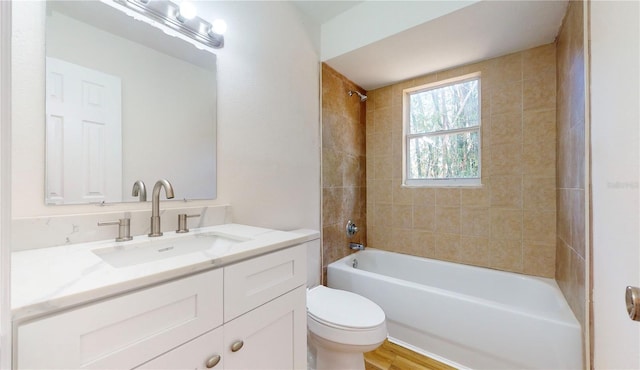 6710 S Juanita St, Tampa, FL 33616 - bathroom featuring shower / bath combination, vanity, toilet, and wood finished floors