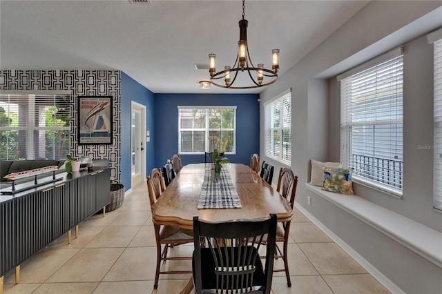 5914 Goldenbark Pl, Lithia, FL 33547 - dining room featuring a chandelier and light tile patterned flooring