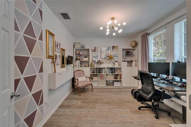 5914 Goldenbark Pl, Lithia, FL 33547 - home office featuring wood finished floors and a chandelier