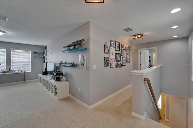 5914 Goldenbark Pl, Lithia, FL 33547 - hall featuring an upstairs landing, carpet flooring, baseboards, and recessed lighting