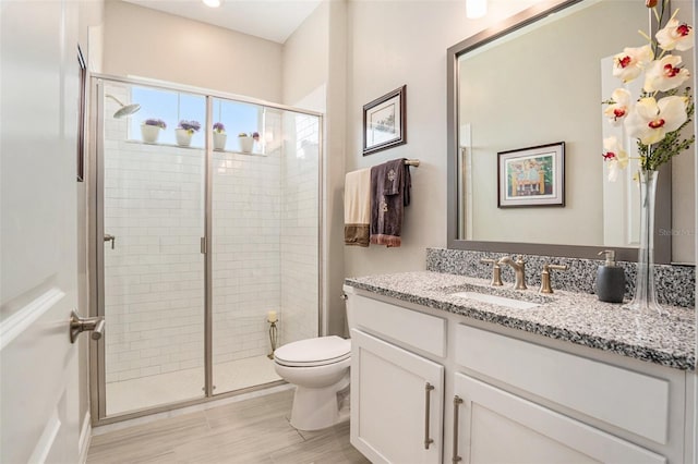 4329 Barletta Ct, Wesley Chapel, FL 33543 - bathroom featuring vanity, a stall shower, and toilet
