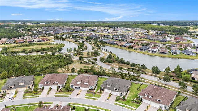 4329 Barletta Ct, Wesley Chapel, FL 33543 - aerial overview of property's location with nearby suburban area and a nearby body of water
