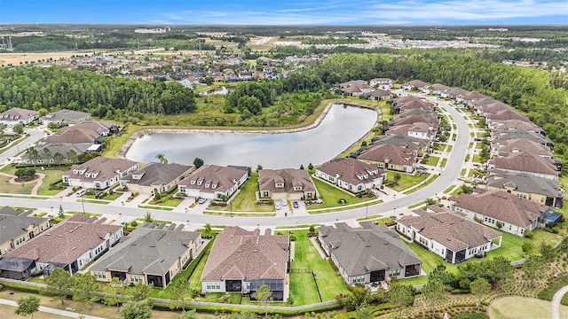 4329 Barletta Ct, Wesley Chapel, FL 33543 - aerial view of property and surrounding area with nearby suburban area and a large body of water
