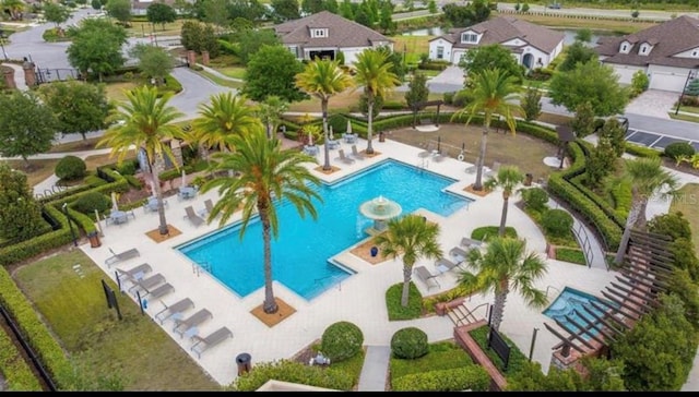 4329 Barletta Ct, Wesley Chapel, FL 33543 - community pool with a patio