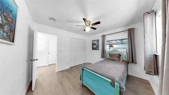 4735 W Oklahoma Ave, Tampa, FL 33616 - bedroom featuring wood finished floors, baseboards, and ceiling fan